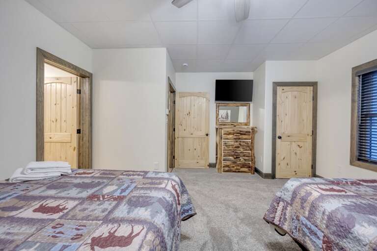 TV and Storage in Bedroom 2