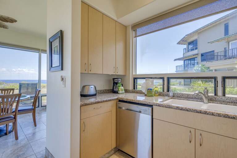 Kitchen window provides great natural light and partial ocean views from sink.