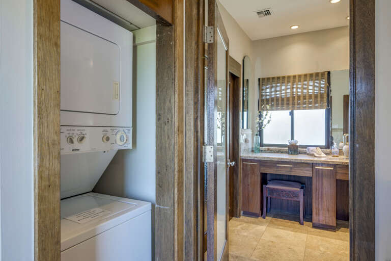 In-unit laundry located before bedroom suite bathroom.  Starter kit of laundry soap provided by Quam Properties. In-unit laundry located before bedroom suite bathroom.  Starter kit of laundry soap provided by Quam Properties.