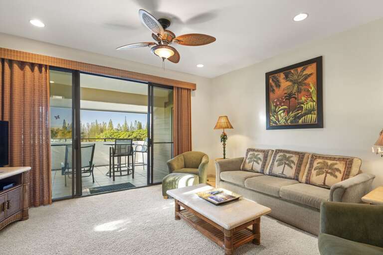 Family living area with view of outside lanai