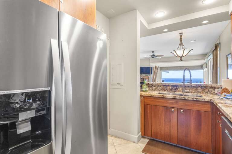 Refrigerator with filtered ice and water dispenser