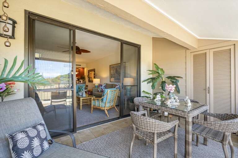 Balcony View Into Breezy Indoor Space, Plush Patio Poised For Relaxation