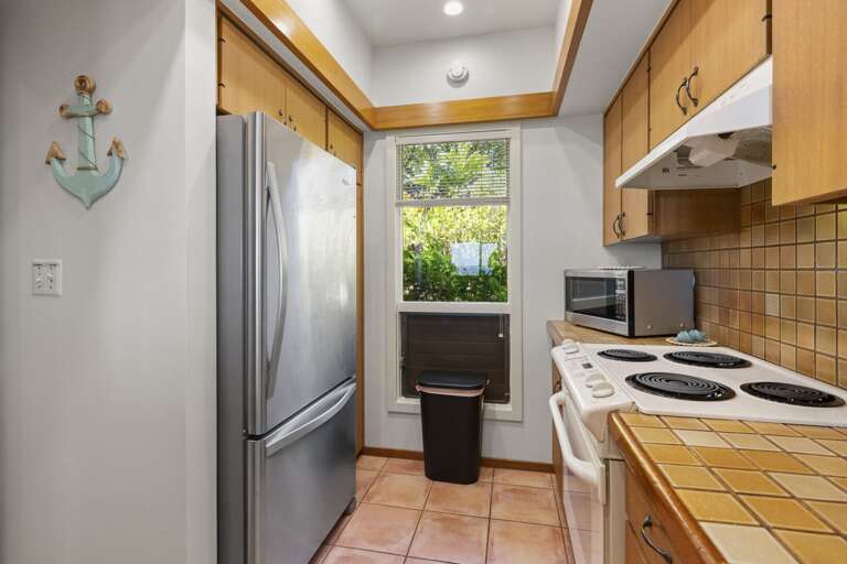 A fully equipped kitchen provides everything you need to make your own Maui-inspired meals.