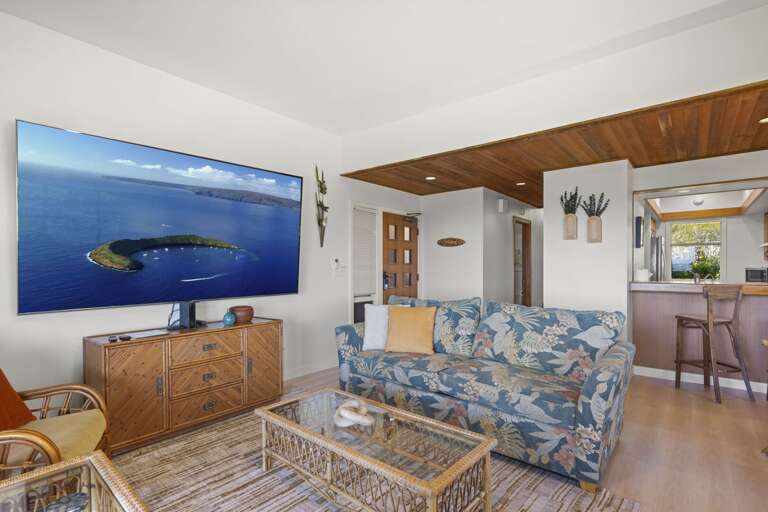 Queen-size sleeper sofa is perfect for extra guests. (This unit can accommodate up to 4 guests)
