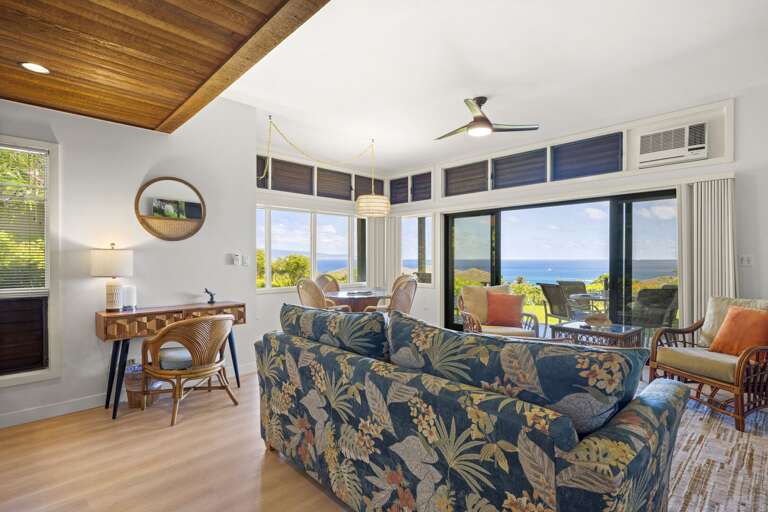 As you step into villa #1011, you're greeted by the ocean view - your very own paradise home!