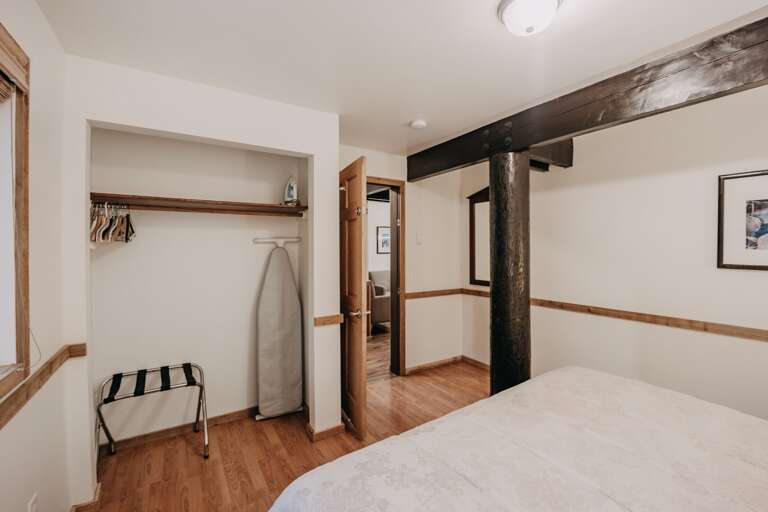 3rd downstairs bedroom with king bed