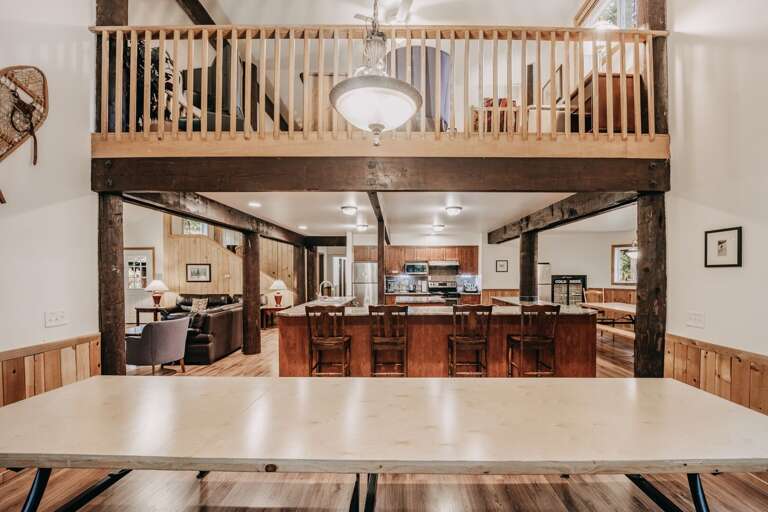 One dining area looking into the kitchen and living room