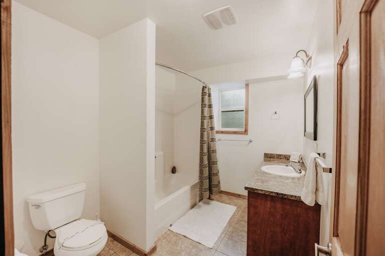 Upstairs bathroom with shower and tub