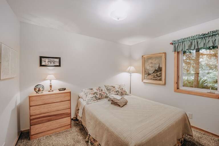 1st of 3-bedrooms. This one is on the main floor with a queen bed.