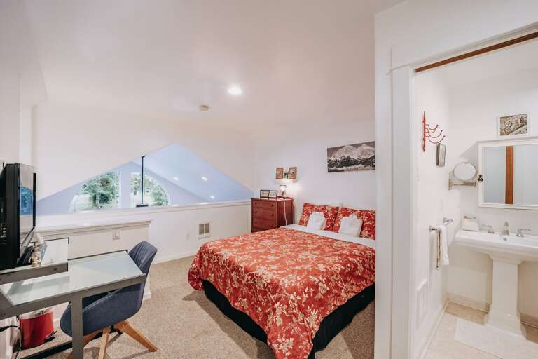 Upstairs loft area with queen bed