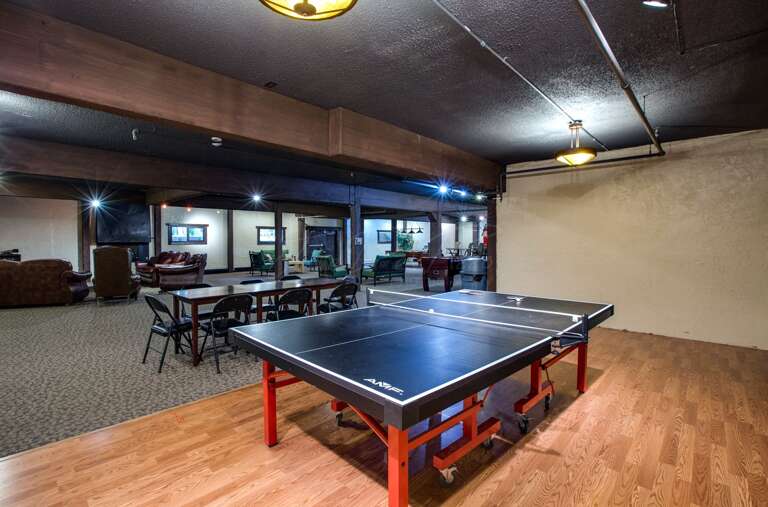 Snowline Lodge downstairs game of ping pong