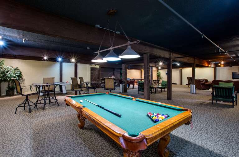 Snowline Lodge downstairs game of pool Snowline Lodge downstairs game of pool