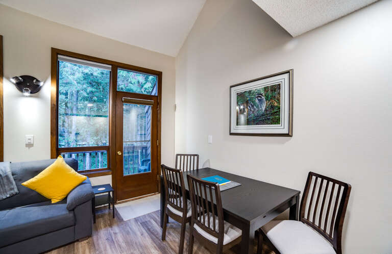 Dining area going out to the back sitting area Dining area going out to the back sitting area