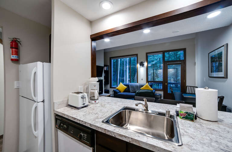 Kitchen looking into the living room Kitchen looking into the living room
