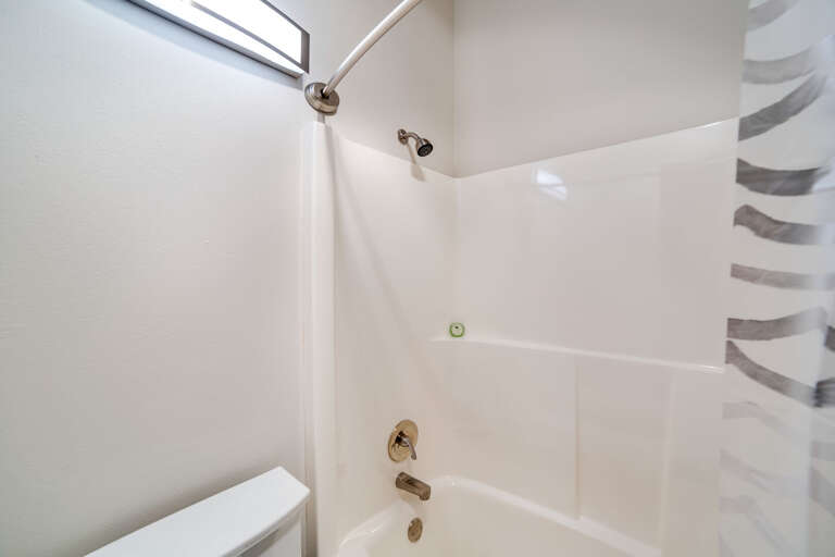 Upstairs bathroom with shower and tub Upstairs bathroom with shower and tub