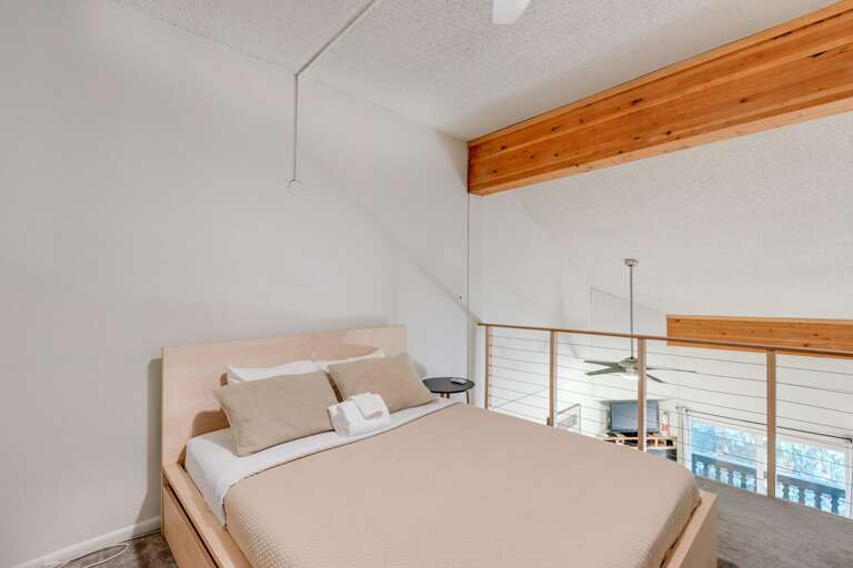 Loft upstairs with a queen bed Loft upstairs with a queen bed