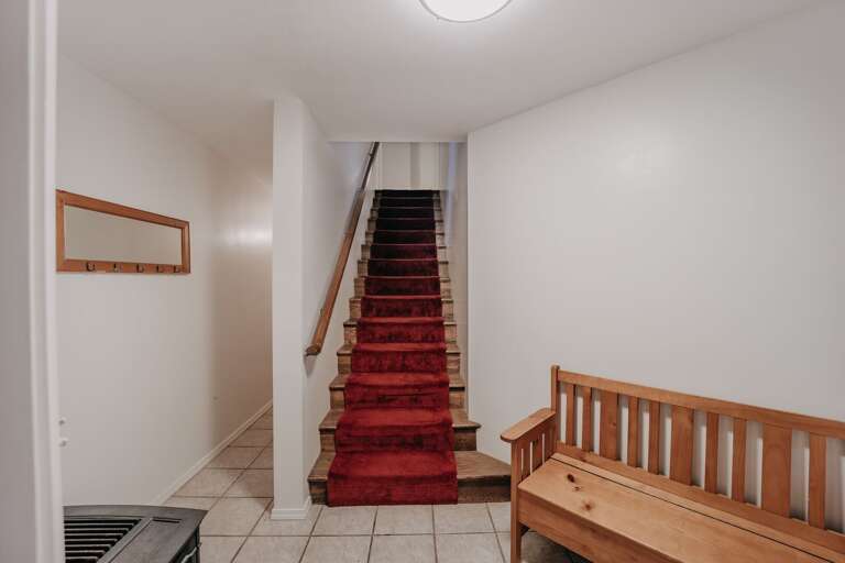 Stairs to main floor Stairs to main floor