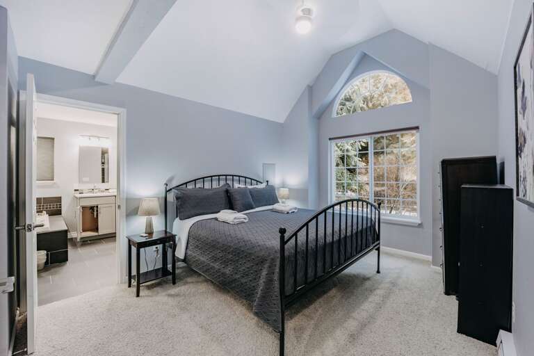 Master bedroom with view of master bathroom