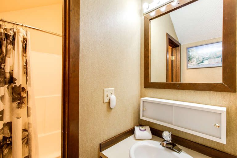 Upstairs bathroom with shower and tub