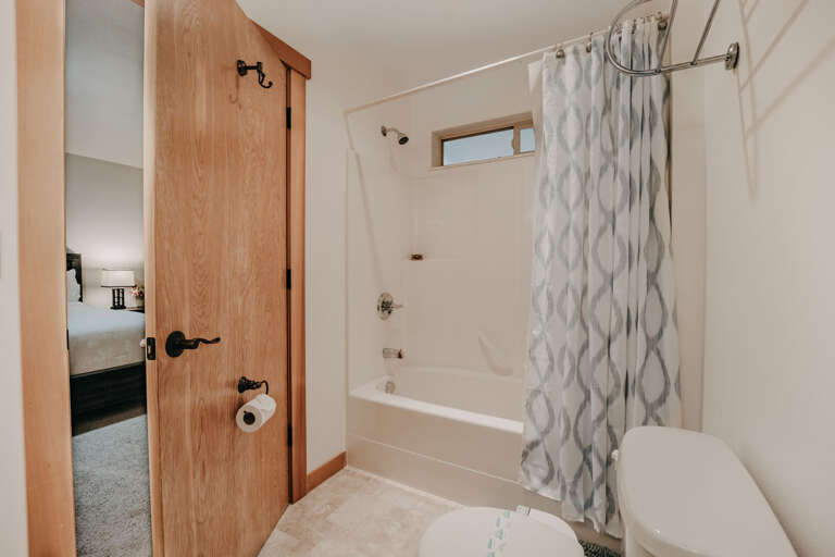Master bathroom with tub and shower