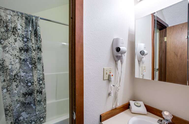 Upstairs bathroom with shower and tub