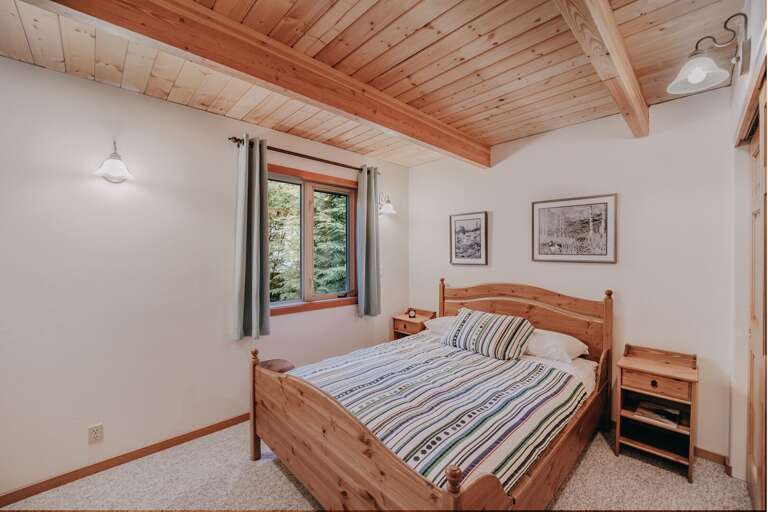 Main floor bedroom with queen-size bed