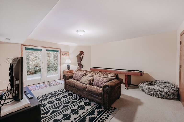 1st floor living room with shuffle board