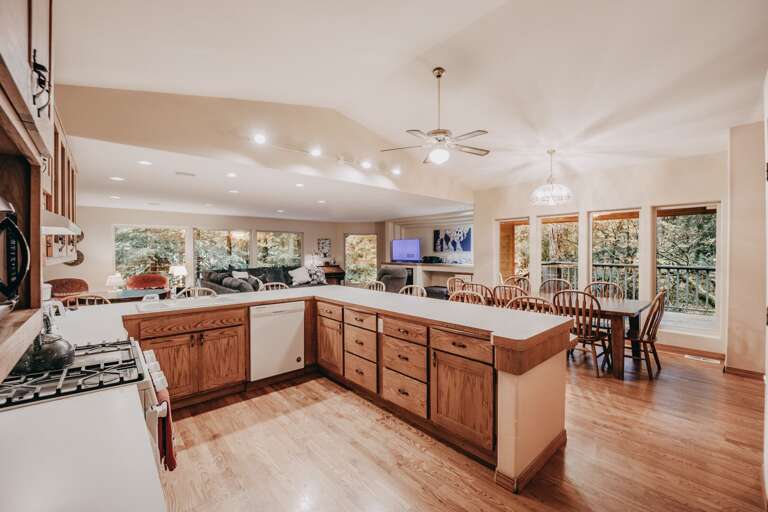 Another view of kitchen, dinning room and main floor