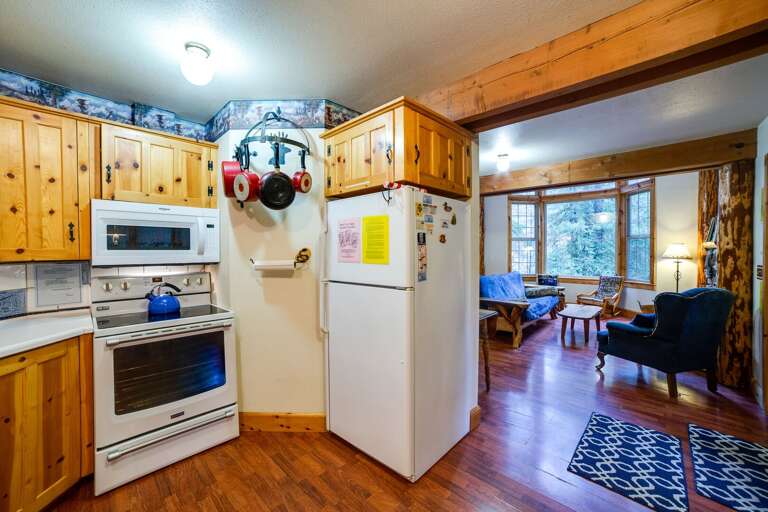 Kitchen with view of living room