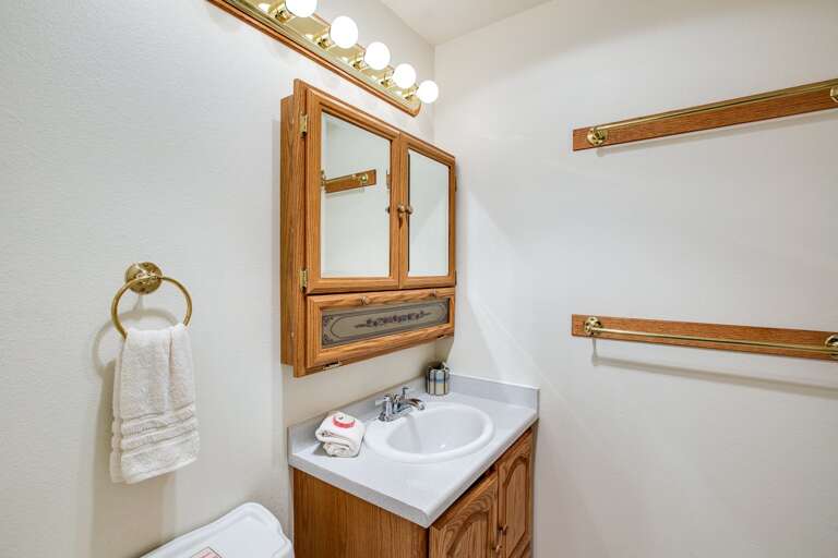 Downstairs 1/2 bathroom Downstairs 1/2 bathroom