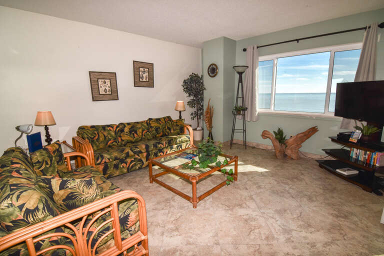 Seaside Vacation Rental Room, Rattan Furniture Facing Ocean View