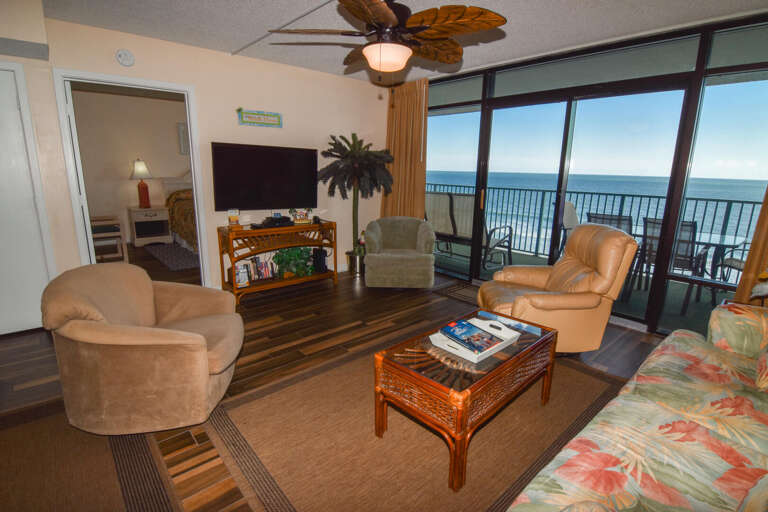 Sea-view Seating Space, Sleek Surfaces, Scenic Sunlit Setting