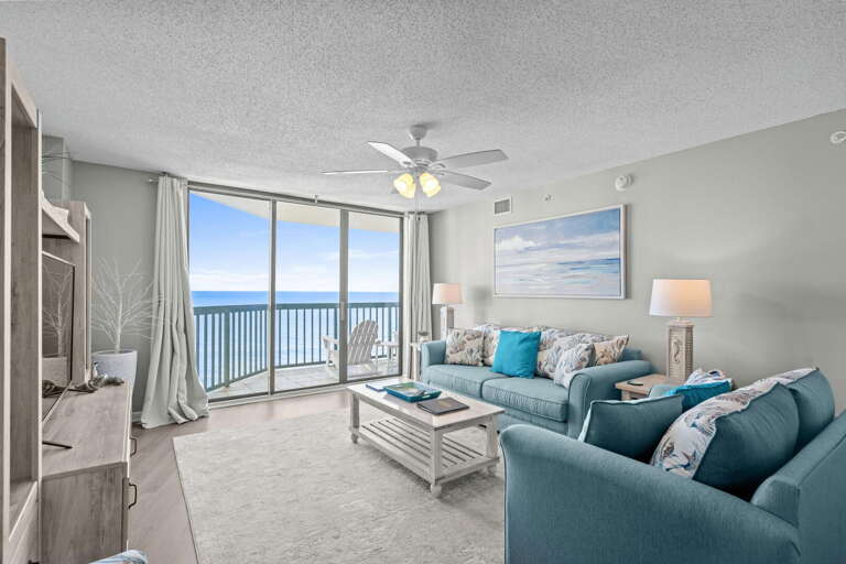 Seaside Vacation Rental With Blue Sofas And Balcony Ocean View