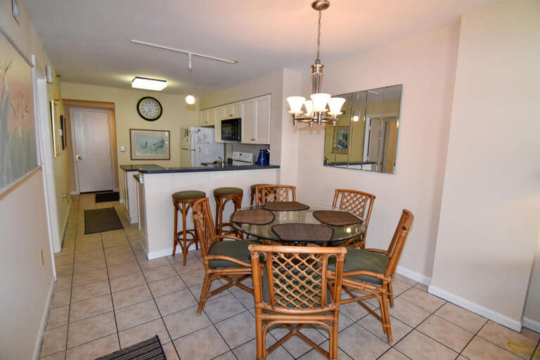 Interior View Showing Dining Area And Kitchen In A Vacation Rental
