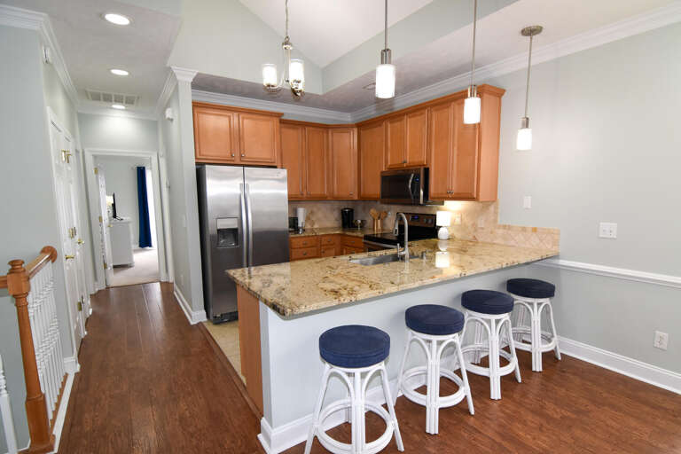 Spacious Kitchen Island In Vacation Rental, Stools Set Alongside