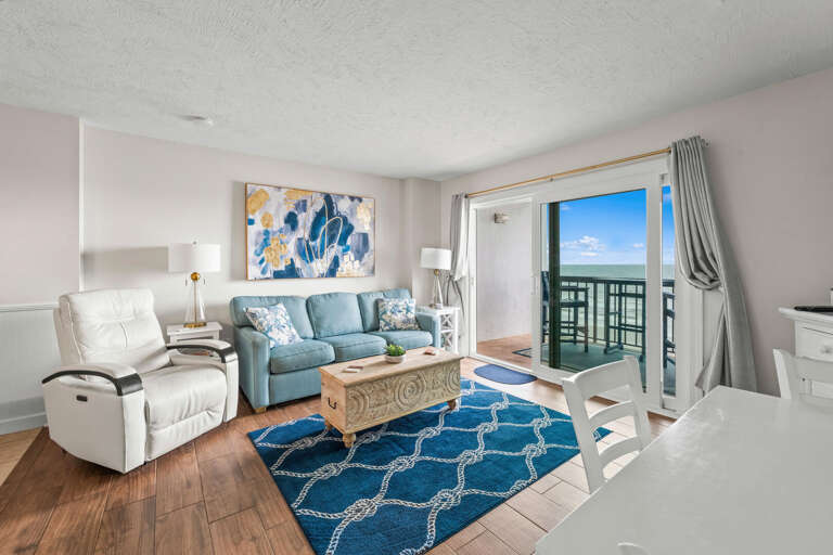 Light Living Space Linking To Luminous Balcony