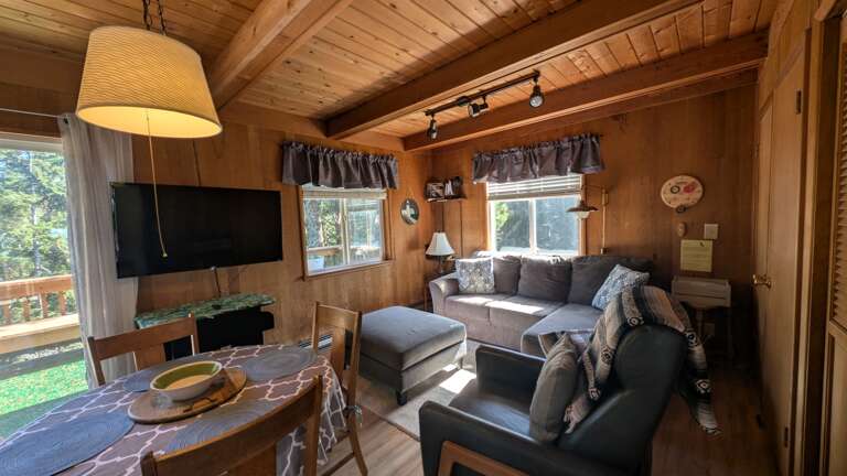 family room with Table &amp; TV