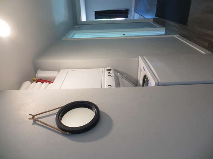 laundry center in hallway