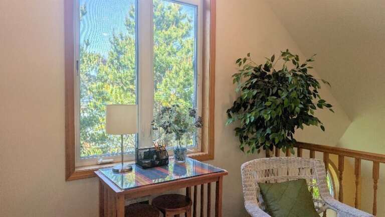 bar height table with 2 stools in loft