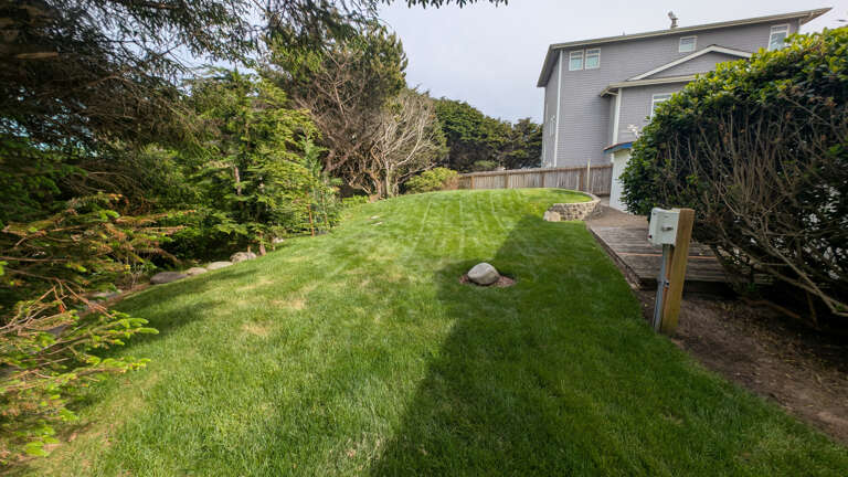 back yard with small deck that gets morning sun