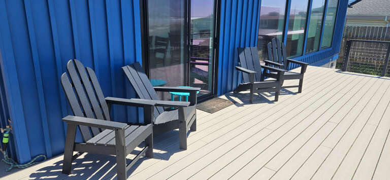 4 outside chairs for deck- 2 true Adirondack & 2 easy out Adirondak