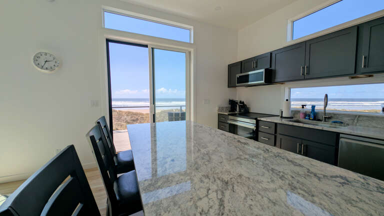 Kitchen with island and seats for 3 with views to the North & West