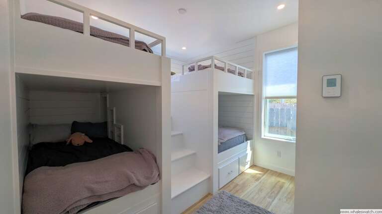 custom bunk room twins on one side, full size on the other