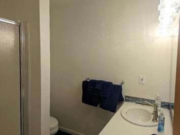 - across the hallway from bunk room