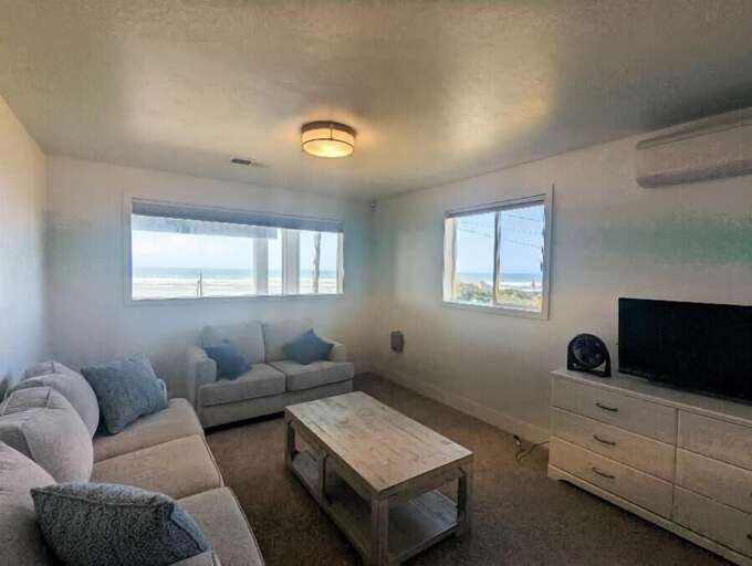 Bunk Room with sofas and TV