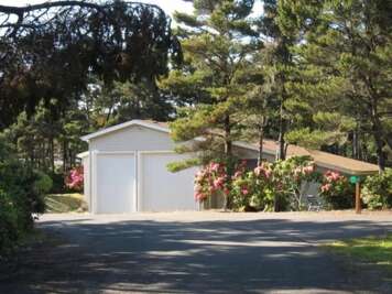 Studio hidden behind the Rhododendrons
