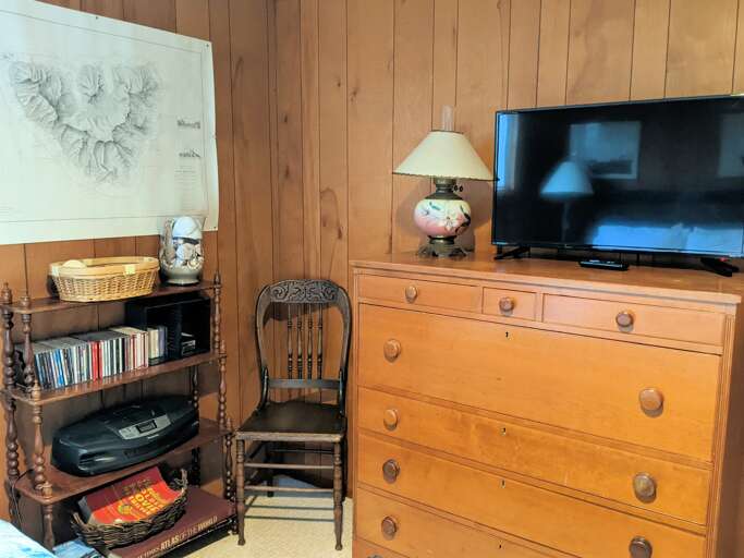 queen bedroom with TV
