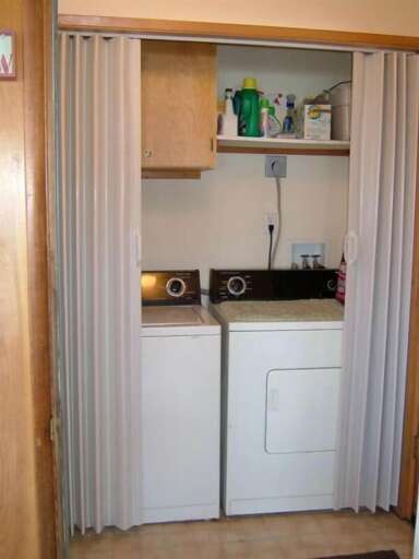 laundry closet in entry way