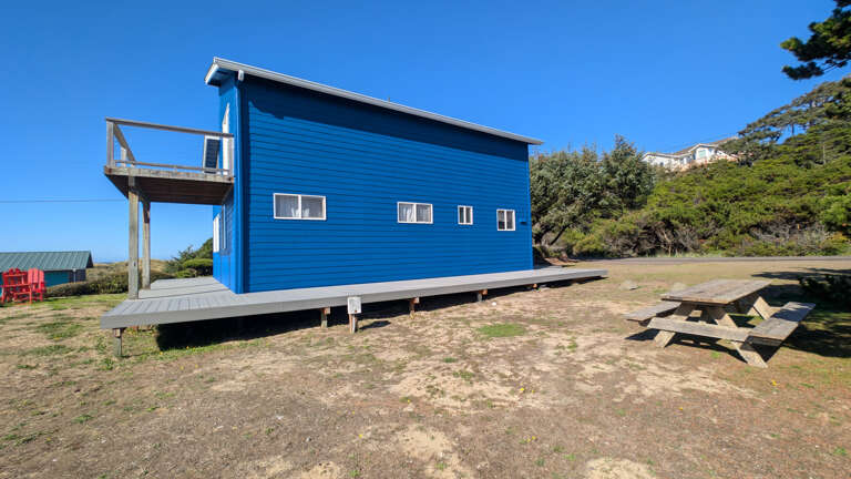 picnic table and south side deck and yard