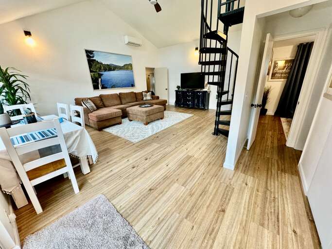 dining area, Living room, hallway to bath &amp; queen bedroom - stairs to loft